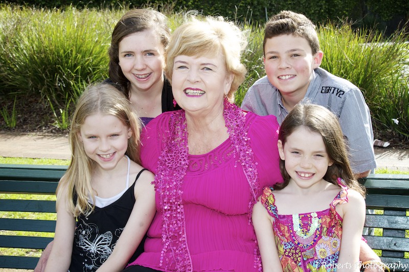 Grandmother laughing with her grand children - family portrait photography sydney
